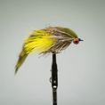 Load image into Gallery viewer, Fishing fly with yellow and brown feathers on a gray background. rabbits foot olive