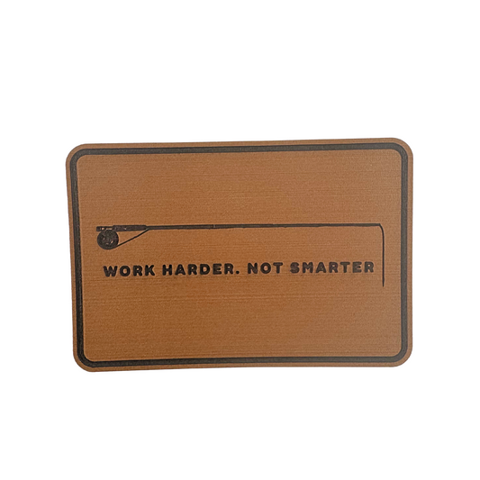 Brown hook pad with 'Work Harder. Not Smarter' text on a white background. perfect for redfish flies